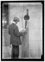 Young man standing near speaker, between 1910 and 1917. Creator: Harris & Ewing.