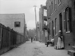 Alley Clearance. Slum Views, 1917