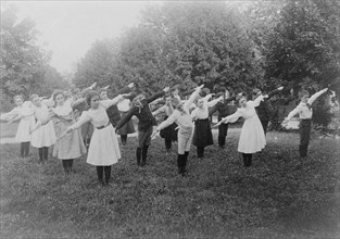 School children exercising on lawn, Washington, D.C., (1899?).