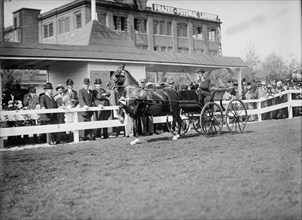 Horse Shows...Gen. Allen And Secretary Dickinson Standing Back of Fence..., 1911. Creator: Harris & Ewing.