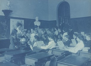 A lesson in globe making. Children in class in a Washington, D.C., school, 1899.