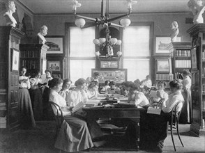 Group of young women reading in library of normal school, Washington, D.C., 1899.
