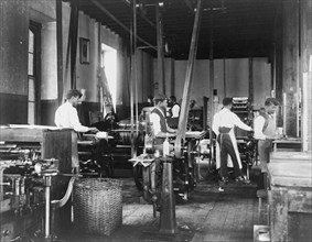 Pressmen at work in printing shop, Hampton Institute, Hampton, Virginia, 1899 or1900.