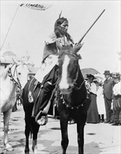 Indian, holding gun, on horse, at the Pan-American Exposition, Buffalo, New York, 1901, printed in 1964.