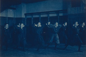Female students exercising in a gymnasium, Western High School, Washington, D.C., (1899?).