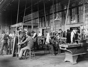 Young men training in use of machinery at Hampton Institute, Hampton, Virginia, 1899 or 1900.
