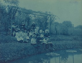 Washington, D.C. public schools field trips - 5th Division children making sketches at edge of pond, (1899?).