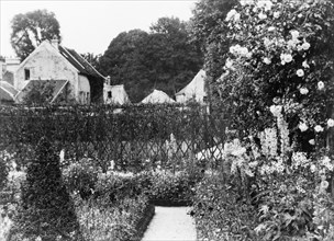 Pavilion Colombe, Mrs. Edith Wharton's villa, St. Brice-sous-Forêt, France, with garden in foreground, 1925.