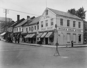 Brick Row, Commerce and Main Streets, located in the vicinity of Fredericksburg or Falmouth Virginia, c1925.