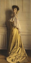 Alice Roosevelt Longworth, full-length portrait, standing, facing left, 1903. Creator: Frances Benjamin Johnston.