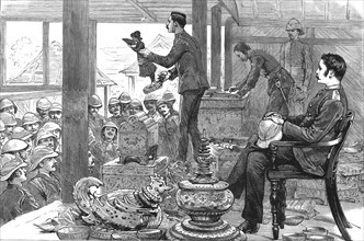 'With Lord Dufferin in Burma - A Loot Auction in the Palace, Mandalay', 1886.   Creator: Unknown.