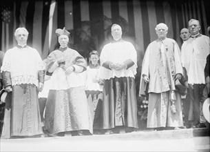 Military Field Mass; Mons. Coleman J. Nevils S.J.; Cardinal Gibbons; Unidentified; Father..., 1912. Creator: Harris & Ewing.