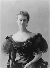 Mrs. Elizabeth Cameron, half-length portrait, seated, facing front, between c1890 and c1910. Creator: Frances Benjamin Johnston.