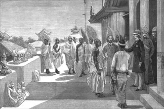 'With Lord Dufferin in Burma - The Viceroy at Mandalay returning Buddist Images', 1886. Creator: Unknown.