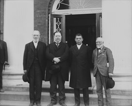 (Left to right) Robert C. Ogden, U.S. Secretary of War William Howard Taft, Booker T..., 1906. Creator: Frances Benjamin Johnston.