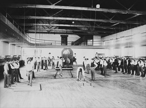 Male Native American students in physical education class, Carlisle..., Pennsylvania, c1901 - 1903. Creator: Frances Benjamin Johnston.