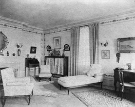 Bedroom with fireplace, padded chaise longue, window, and polar..., Greenwich, Connecticut, 1908. Creator: Frances Benjamin Johnston.