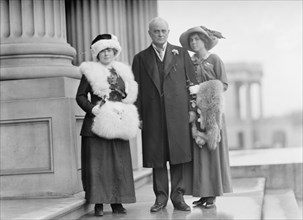 Champ Clark, Rep. from Missouri, with Helen Cox, Left, and Daughter Genvieve [sic], 1912. Creator: Harris & Ewing.
