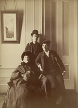 Frances Benjamin Johnston (right), full-length self-portrait dressed as a man with..., c1880 - 1900. Creator: Frances Benjamin Johnston.