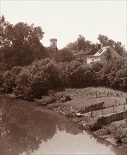 Houses on Water Street, from the bridge, Fredericksburg, Virginia, between 1927 and 1929. Creator: Frances Benjamin Johnston.