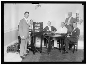 Bobroff voting machine being considered for use in house, between 1910 and 1917. Creator: Harris & Ewing.