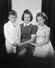 Vincent P. Aherns, Portrait, 1933. Boy with sisters.