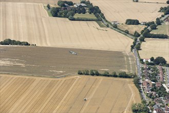 A two seat Spitfire in flight near Goodwood Aerodrome, West Sussex, 2020.