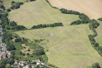 A two seat Spitfire in flight near Goodwood Aerodrome, West Sussex, 2020.
