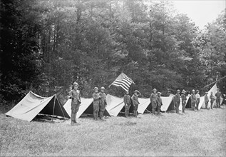 Boy Scouts Standing In Front of Tents In Encampment, between 1914 and 1917.