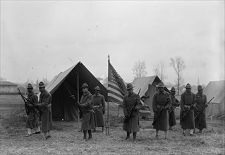 Army, U.S. Negro Troops, 1917. [African American soldiers with fixed bayonets].