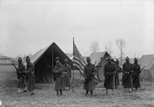Army, U.S. Negro Troops, 1917. [African American soldiers with fixed bayonets].