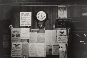 Posters and decorations in combined general store and post office, Olga, Louisiana,  1938-09.
