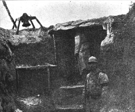 'Les Gaz Allemands; Cloche installee pres d'un abri de guetteur pour lui..., 1916. Creator: Unknown.
