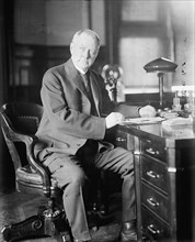 Albert Sidney Burleson, Rep. from Texas - At Desk, Post Office Department, 1913.  Creator: Harris & Ewing.