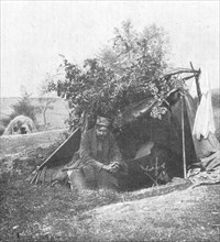 ''M. Vladimir Betzitch, peintre militaire serbe, sous sa tente, au debut de la campagne.', 1916. Creator: Unknown.