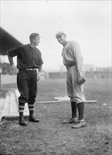 Christy Mathewson And Walter Johnson, New York Nl (Black) And Washington Al (Baseball), 1912. Creator: Harris & Ewing.