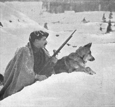 'Skieurs et chiens de guerre dans les neiges vosgiennes; Un chien esquimau en sentinelle..., 1916. Creator: Unknown.
