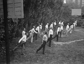 Camp, Walter, I.E, Exercise School - Cabinet Officials Exercising with Other Govt. Officials, 1917.
