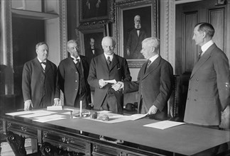 Daniels, Josephus, Secretary of The Navy, 1913-1921; Brun, Constantine, Ambassador from..., 1917. Creator: Harris & Ewing.