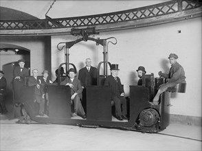 O'Gorman, James Aloysius. Senator from New York, 1911-1917. 3rd from Right, Riding Monorail Car, 1912.
