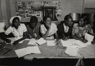 Students writing, 1935 - 1943.