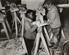 Boys sculpting a horse, Harlem Community Art Center, 1937.