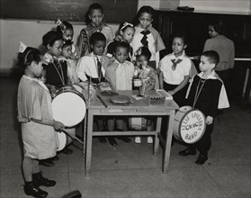 Drum students around a table, 1938.