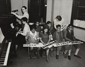 Music classes, keyboards and piano, 1938.