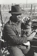 Negro sharecropper and son who will be resettled, Transylvania Project, Louisiana, January 1939.