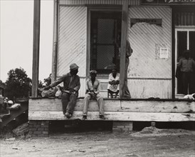 Negroes hanging around the plantation store. Mississippi Delta, 1936.