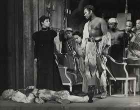 Rex Ingram, shirtless, with dead man, 1938.