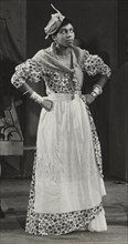 Sybil Moore portraying a typical West Indian character, 1937.