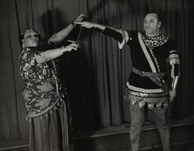 Minto Cato as Azucena and Parker Watkins as Manrico, swearing vengeance on a sword, 1936.