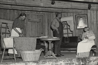 Woman ironing, 1935 - 1939.